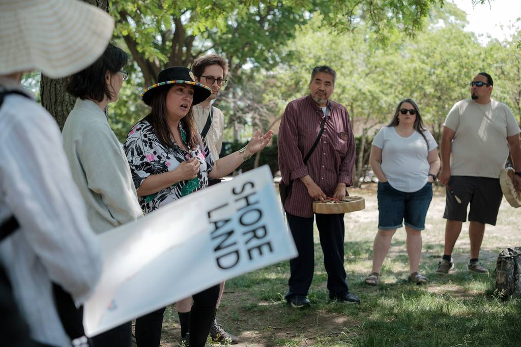 Billie Warren, a member of the Pokagon Band of Potawatomi, sparked a discussion with attendees before Lee's 4-mile audio tour along Chicago's lakeshore on June 10, 2023.