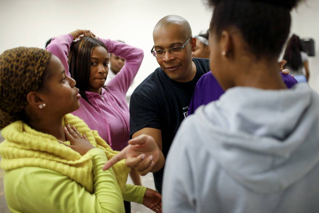 Bril Barrett, head of the MADD Rhythms center, dance instructor and choreographer, works with high school students in an after-school program at the dance studio located at the Harold Washington Cultural Center in Chicago on November 30, 2016. 