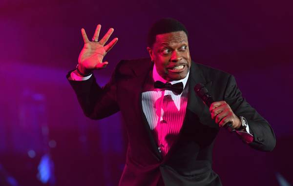 Chris Tucker speaks on stage during Celebrity Fight Night XXV on March 23, 2019 in Phoenix.