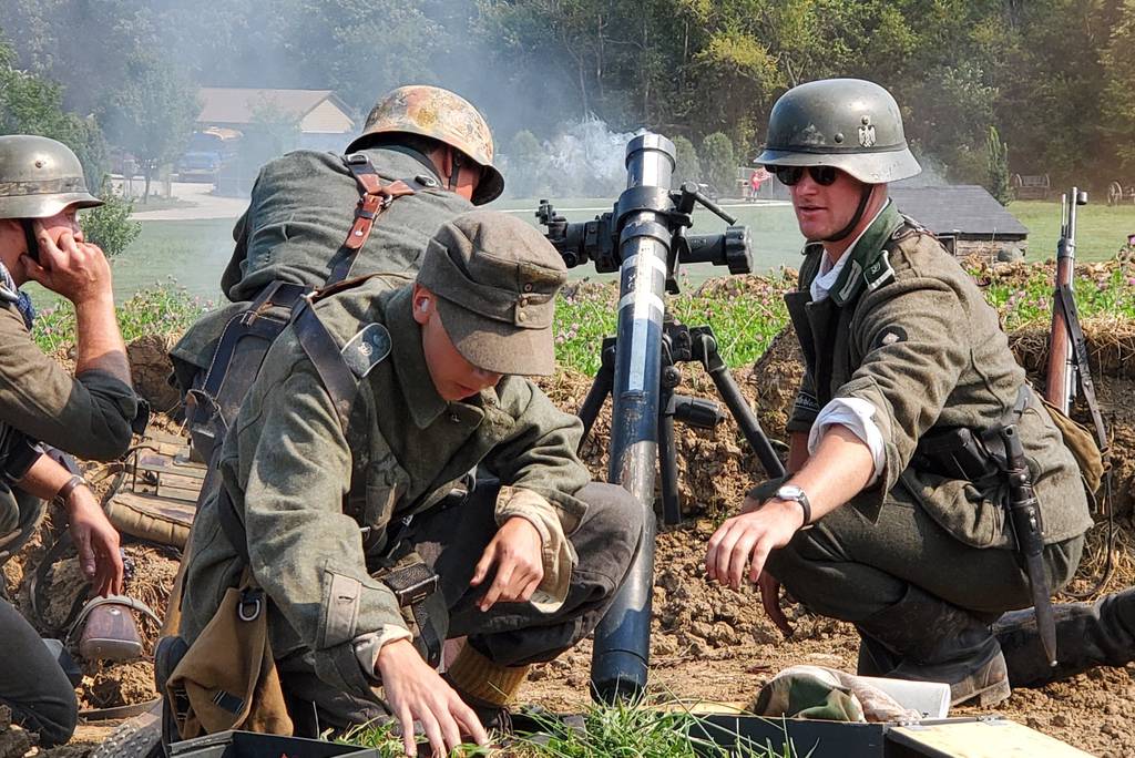 Reenactors portraying German soldiers prepare to fire mortars during a Military History Weekend reenactment at Dellwood Park, 199 E. Woods Drive in Lockport.  This year's event will take place in the park on Saturday from 09:30 to 21:00 and on Sunday from 09:30 to 17:00.