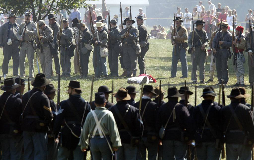 Union troops confront Confederates during a Civil War Days reenactment in Lockport in 2002.  The event is now known as Military History Weekend, as many re-enactors have turned to depicting World War II warriors.