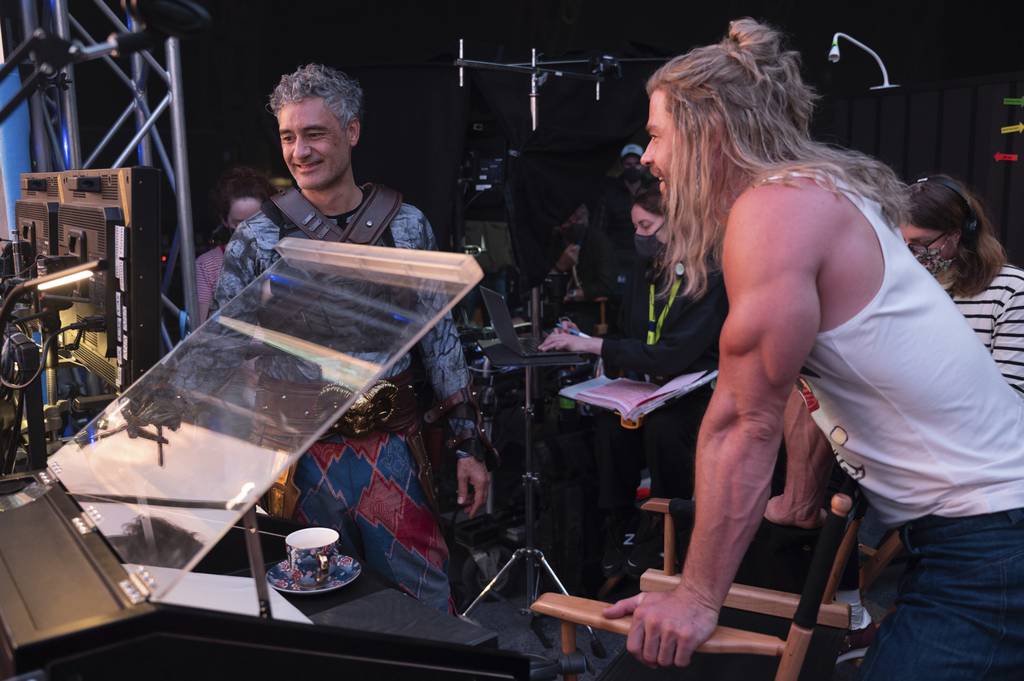 From left to right: Taika Waititi and Chris Hemsworth on set "Thor: Love and Thunder."