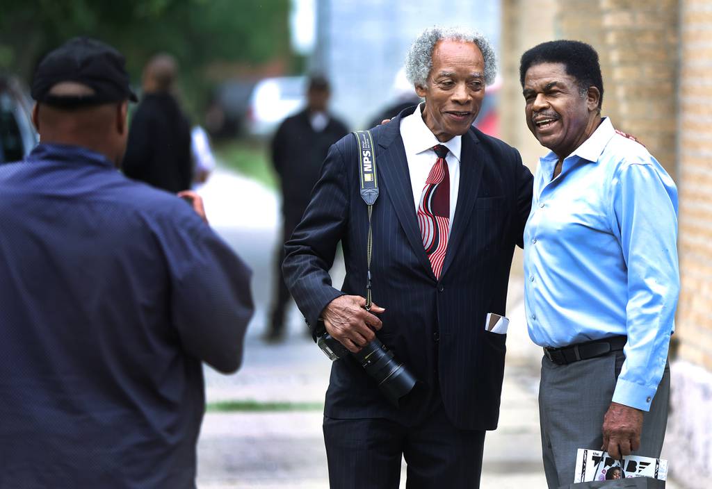 Former Chicago Sun-Times photojournalist John H. White (left) stands with former Chicago Tribune photojournalist Ovie Carter after a speech at the South Side Community Arts Center in Chicago on September 16, 2023.