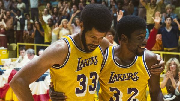 From left to right: Solomon Hughes and Quincy Isaiah as Kareem and Magic in a scene from “Winning Time.” 