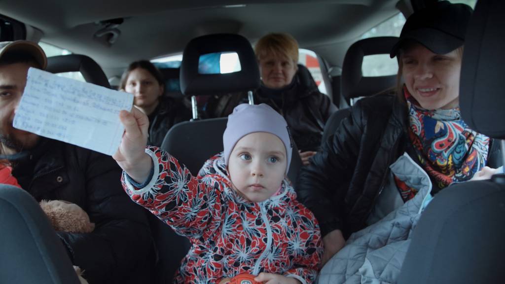 Ukrainian refugees travel dangerous path to safety in documentary "In Rear View."