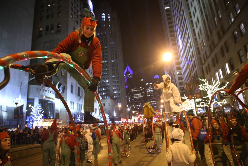 Artists work on Michigan Avenue during the Magnificent Mile Lights Festival in Chicago on November 23, 2019.