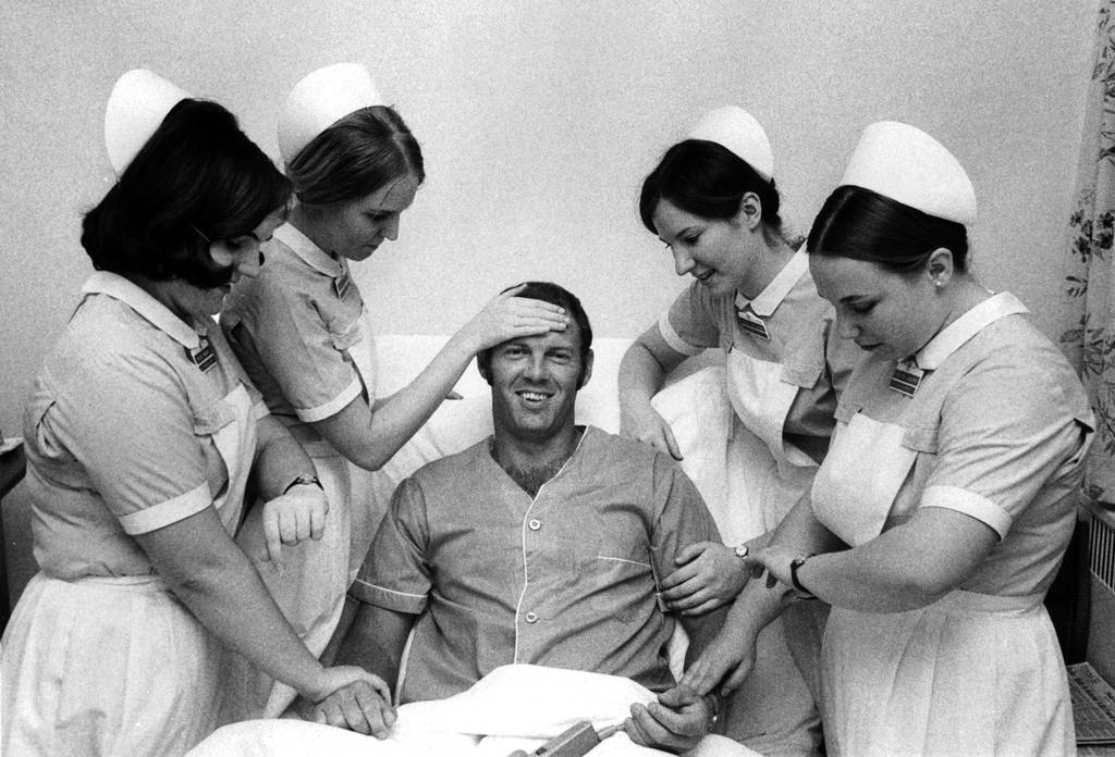 Randy Hundley, who caught the cubs, recovers from a knee injury alongside student nurses at Wesley Hospital in Chicago on April 14, 1971.