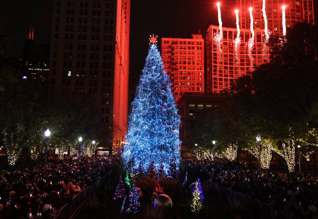 Viewers watch as Chicago's Christmas tree is lit in Millennium Park on November 18, 2022.
