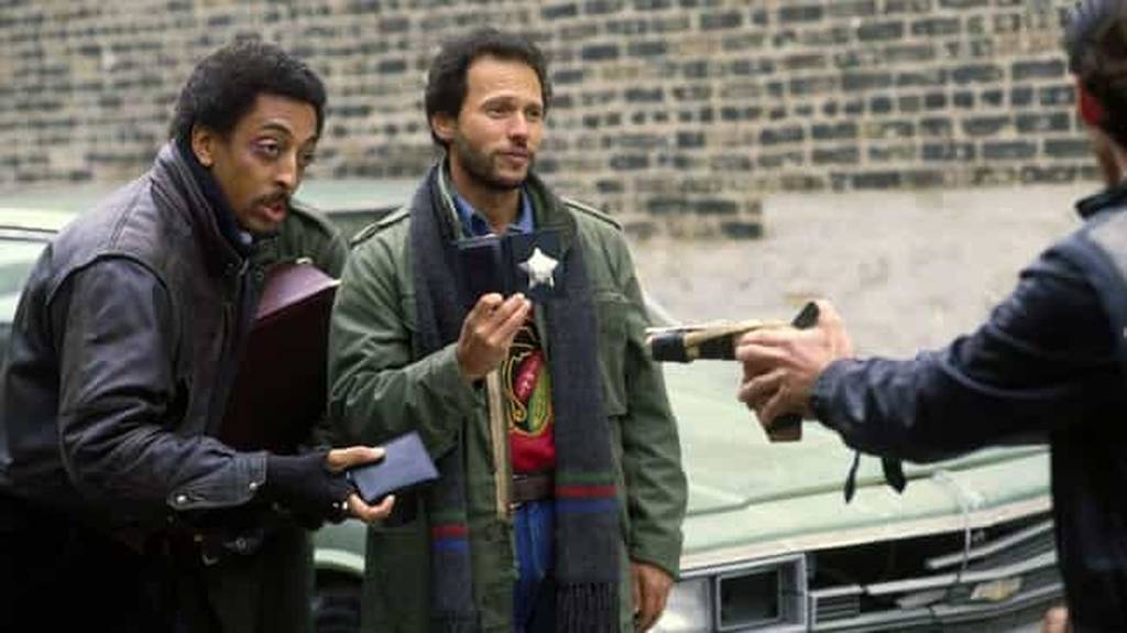 The 1986 action comedy stars, from left, Gregory Hines and Billy Crystal "Running away in fear."