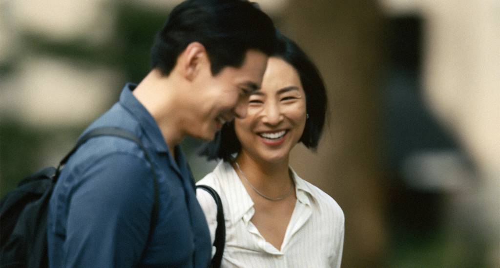 Greta Lee (right) and Teo Yoo in a scene "Past Lives."