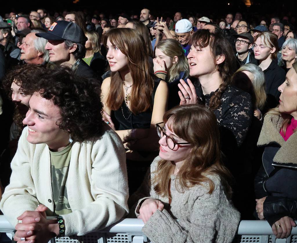 Fans watch Patti Smith and her band perform at Salt Shed on December 27, 2023.  