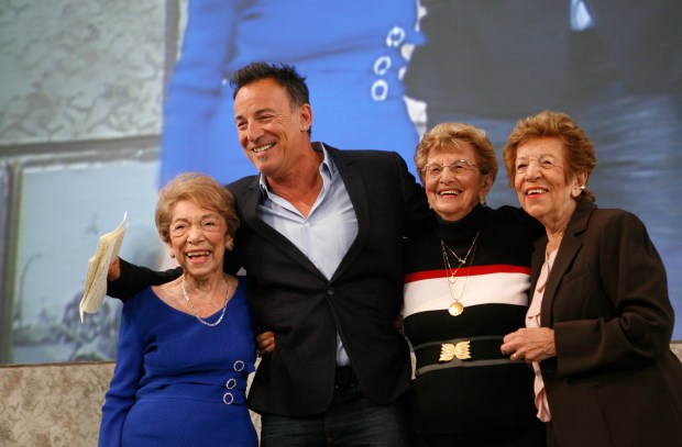 Singer Bruce Springsteen poses with, from left, his aunt Dora Kirby, his mother Adele Springsteen and his aunt Ida Urbelis after being honored at the Ellis Island Family Legacy Awards on April 22, 2010 at Ellis Island, New York.