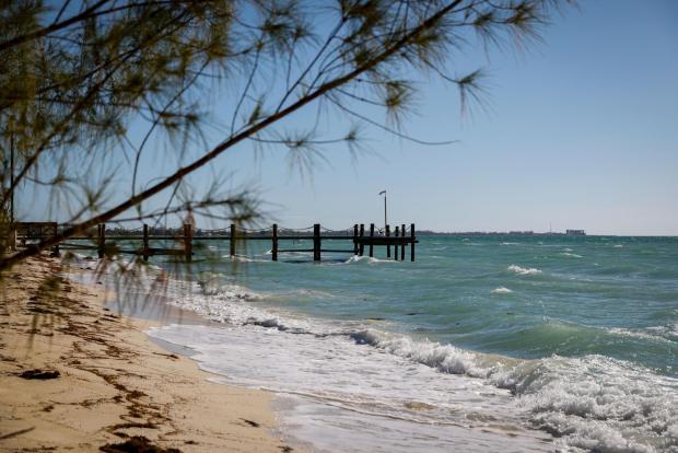 A pier and beach at Adelaide Village in Nassau, Bahamas on December 15, 2022.