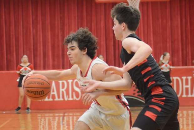 Marist's Adoni Vassilakis prepares to go in against Benet during an East Suburban Catholic Conference game Friday, Feb. 2, 2024, in Chicago.  (Jeff Vorva/Daily Southtown)