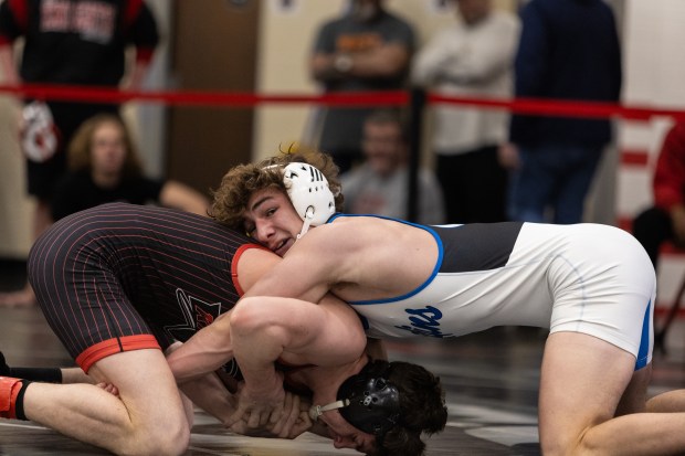 Lincoln-Way East's Rory Moran defeated Lincoln-Way Central's Tim Key in the 165-pound title match at the IHSA Class 3A Rich Township regional wrestling on Saturday, Feb. 3, 2024, in Richton Park.  (Vincent D. Johnson / Daily Southtown).