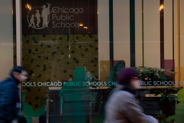 CPS sign in windows outside CPS headquarters on Thursday, Dec. 14, 2023.  (Antonio Perez/Chicago Tribune)