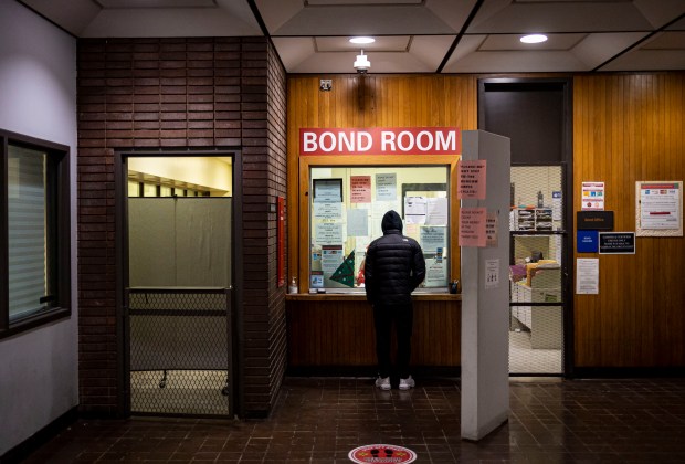 A man posts cash bail at the bond office in Cook County Jail Division 5 on Dec. 21, 2022.  Lawmakers eliminated cash bail and overhauled the pretrial system in historic reforms that take effect on September 18, 2023.