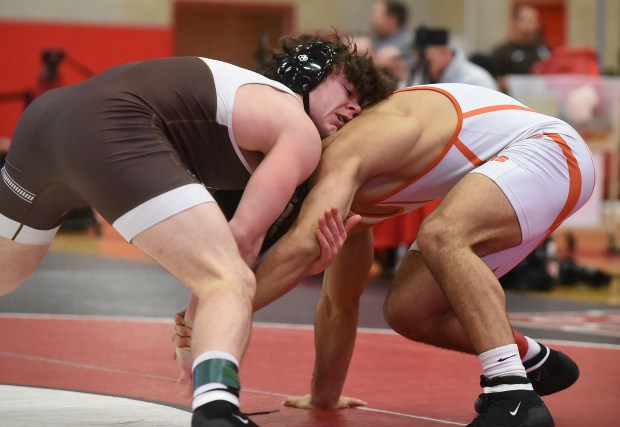 Mt.  Carmel's Colin Kelly wrestled Wheaton Warrenville South's Sedeeq Al Obaidi 19-7 at 175 pounds at the Class 3A Hinsdale Central Sectional on Saturday, February 10, 2024 in Hinsdale, IL.  (Steve Johnston/Daily Southtown)