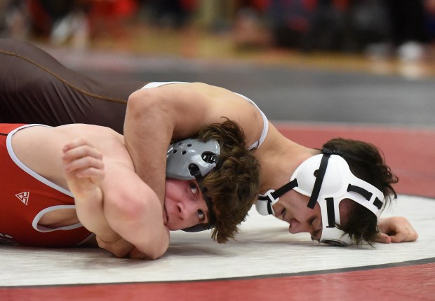 Mt.  Carmel's Evan Stanley wrestled Marist's Ethan Sonne 7-2 at 132 pounds at the Class 3A Hinsdale Central Regionals on Saturday, February 10, 2024 in Hinsdale, IL.  (Steve Johnston/Daily Southtown)