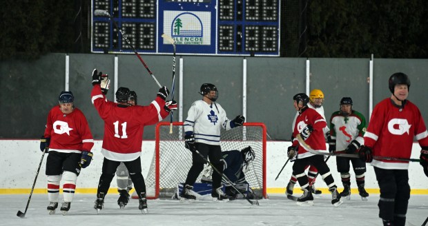 Last shot.  Celebration when the scrimmage or play ends.  No one knows the real final score and it is not reflected in the scoreboard.  But the red team, the Glencoe Bantam Allstars, won the game on Feb. 3, 2024, at the Weinberg Family Recreation Center in Glencoe.