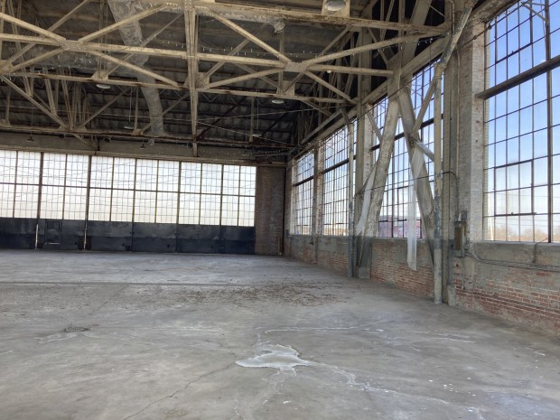 Officials said the Ford Hanger's architecture was innovative for its time and lacked center support beams.  Rails used to open and close hangar doors and windows wrap around the inside of the building.  (Alexandra Kukulka/Daily Southtown)