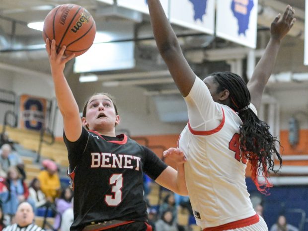 Benet's Aria Mazza (3) shoots around Bolingbrook's Jasmine Jones (40) during an Oswego 4A Regional semifinal basketball game on Tuesday, Feb. 20, 2024.  (Mark Black/Naperville Sun)