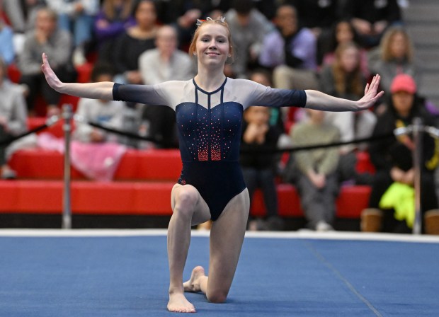 Oswego's Sam Phillip performs Floor Exercise during the IHSA State Meet finals on Saturday, Feb. 17, 2024, at Palatine High School.  (Brian O'Mahoney for the Chicago Tribune)