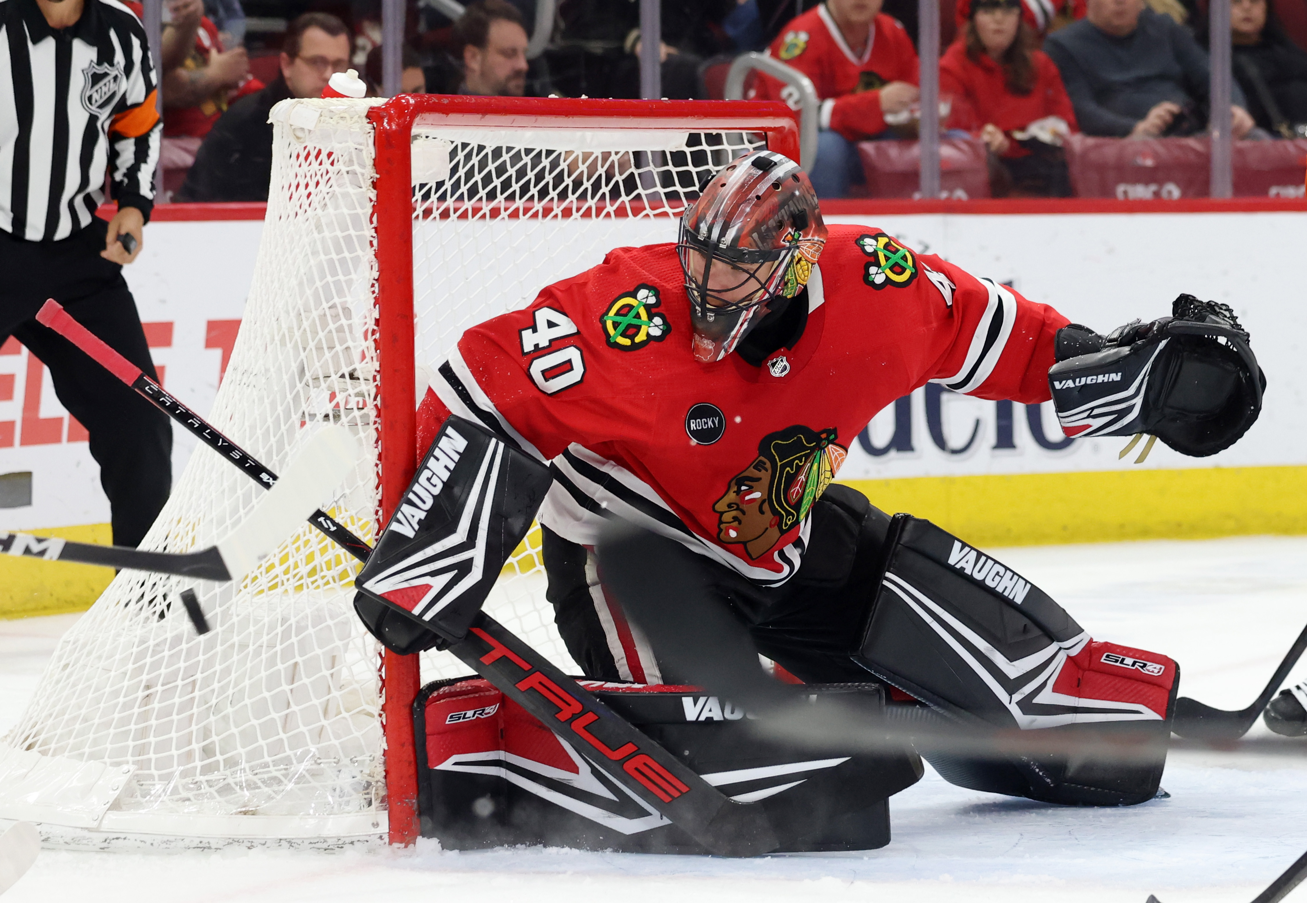 Blackhawks goaltender Arvid Soderblom watches the puck fly away during the second period against the Flyers at the United Center on Feb. 21, 2024 in Chicago.  (John J. Kim/Chicago Tribune)