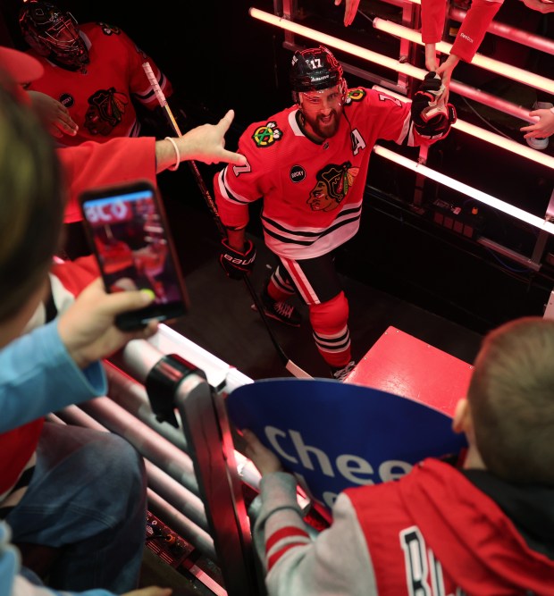 Blackhawks left wing Nick Foligno (17) takes the ice to warm up before a game against the Flyers at the United Center on February 21, 2024 in Chicago.  (John J. Kim/Chicago Tribune)