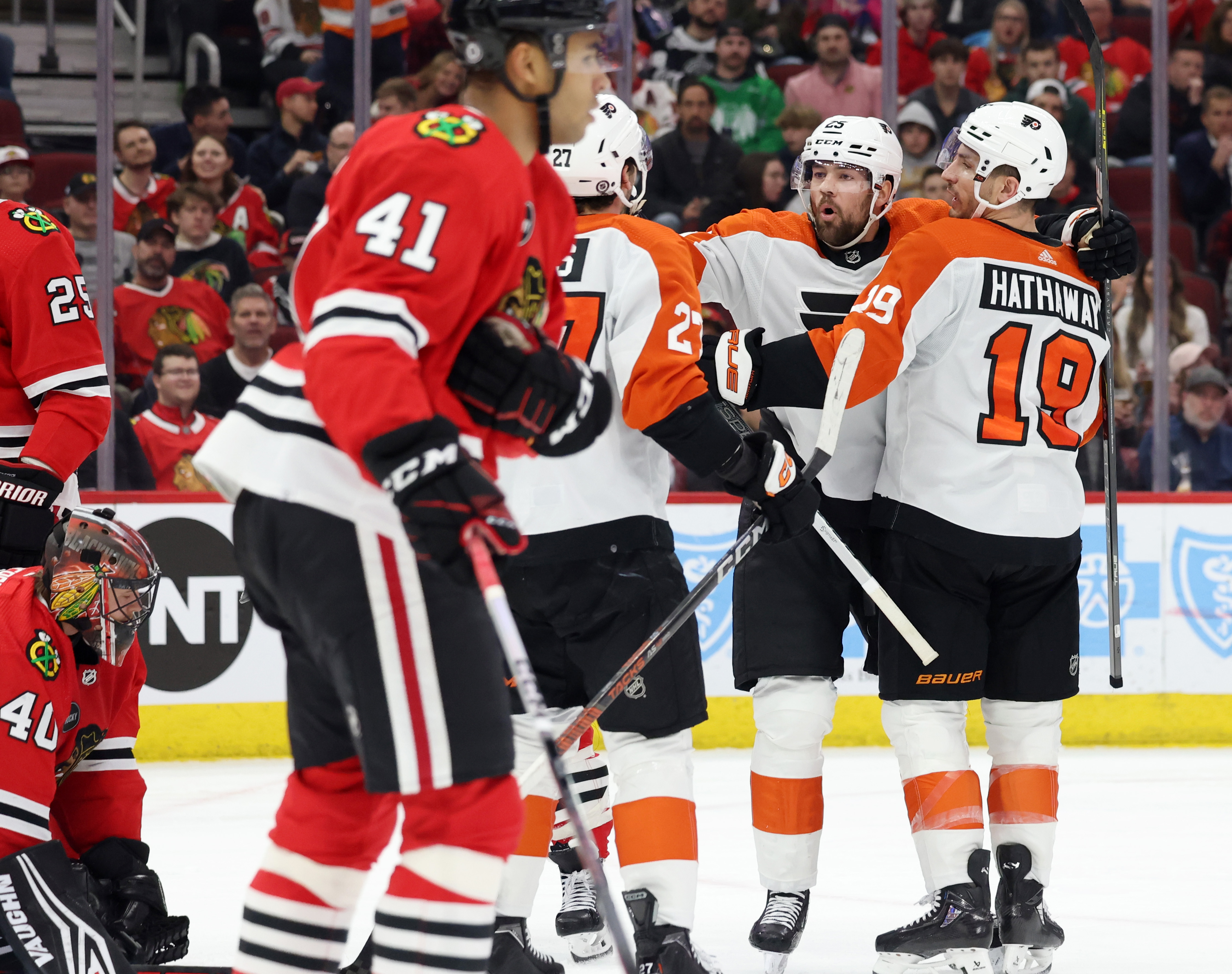 Flyers right wing Garnet Hathaway (19) and her teammates celebrate after Hathaway scored in the second period against the Blackhawks at the United Center on February 21, 2024 in Chicago.  (John J. Kim/Chicago Tribune)
