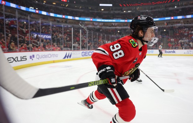 Blackhawks center Connor Bedard slides into play during the first period against the Flyers at the United Center in Chicago on Feb. 21, 2024.  (John J. Kim/Chicago Tribune)