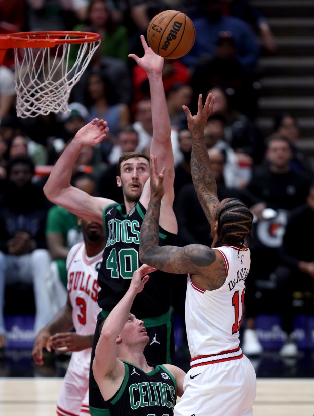 Bulls forward DeMar DeRozan shoots at Celtics center Luke Kornet at the United Center on February 22, 2024. 
