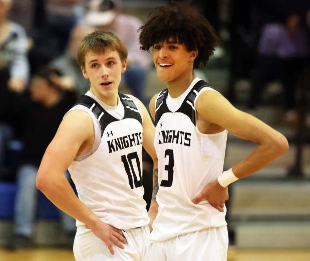 Kaneland's Troyer Carlson (10) and Evan Frieders (3) react to Marion's foul in the fourth quarter of the Class 3A Marmion Regional final game in Aurora on Friday, Feb. 23, 2023.  Kaneland won 58-50.H.  Rick Bamman / For Beacon News