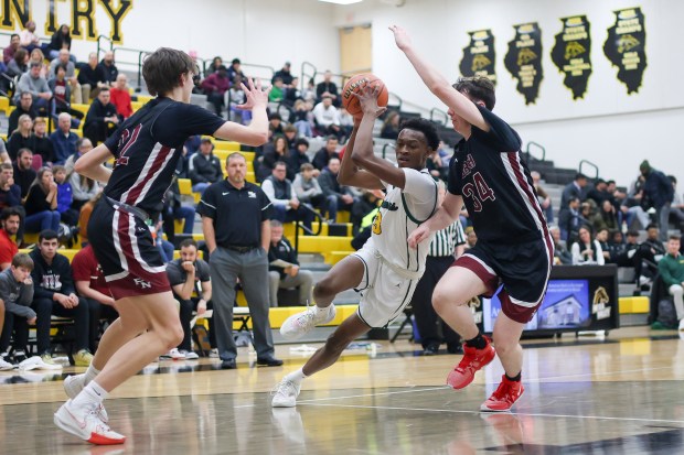 Waubonsie Valley's Tre Blissett (3) drives to the basket during the Class 4A Metea Valley Regional final against Plainfield North on Thursday, Feb. 22, 2024.  (Troy Stolt for Aurora News Beacon)