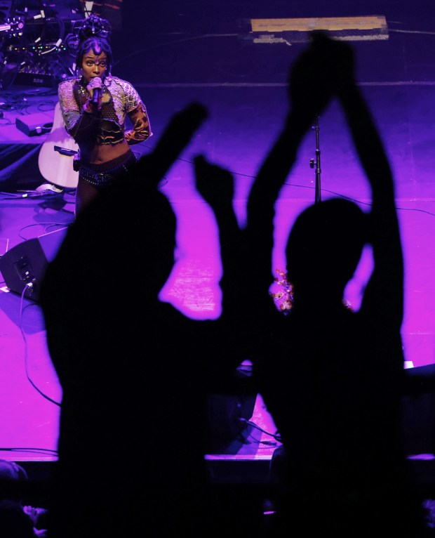 Concertgoers dance during Jamila Woods' performance at the Vic Theatre.