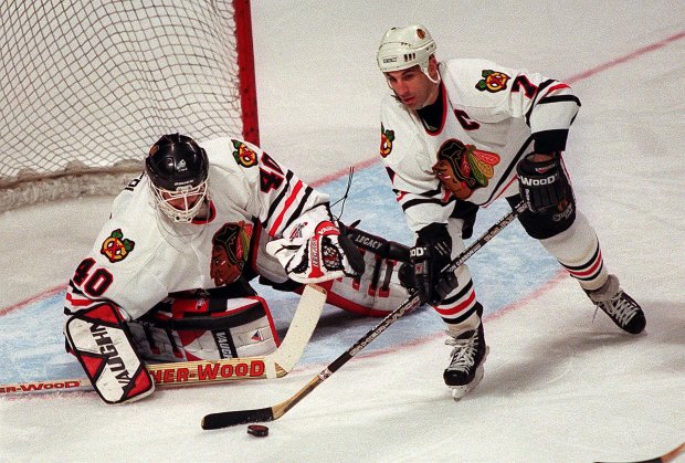 Defenseman Chris Chelios helps goaltender Chris Terreri clear the puck from the Blackhawks zone against the Devils at the United Center on April 16, 1998.  (Wes Pope/Chicago Tribune)