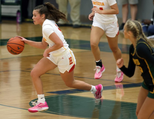 Batavia's Addi Lowe (4) on a fast break after a second-quarter steal against Fremd in the Class 4A Bartlett Supersectional on Monday, Feb. 26, 2024, in Bartlett.  Batavia lost 65-46.  H. Rick Bamman / For Beacon News