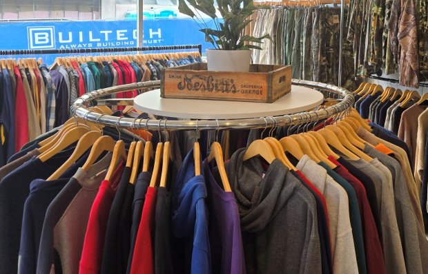 Matthew Hill, owner of the newly opened Elgin Vintage store, says that the previously owned clothes he sells are carefully selected to be both fashionable and to draw attention to the benefits of recycling instead of throwing used clothes in the trash.
