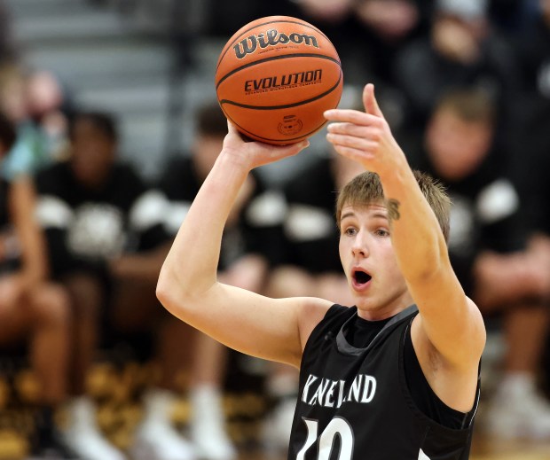 Kaneland's Troyer Carlson (10) plays scrimmage against Belvidere North in the second quarter of the Class 3A Kaneland Regional semifinal game at Maple Park on Wednesday, Feb. 28, 2024.  Kaneland won 57-55.H.  Rick Bamman / For Beacon News