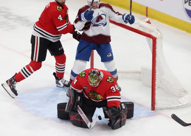 Blackhawks goaltender Petr Mrázek (34) stops a shot on goal in the first period against the Avalanche at the United Center on February 29, 2024.  (John J. Kim/Chicago Tribune)