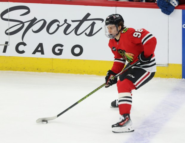 Blackhawks center Connor Bedard advances the puck during the first period against the Avalanche at the United Center on Feb. 29, 2024.  (John J. Kim/Chicago Tribune)