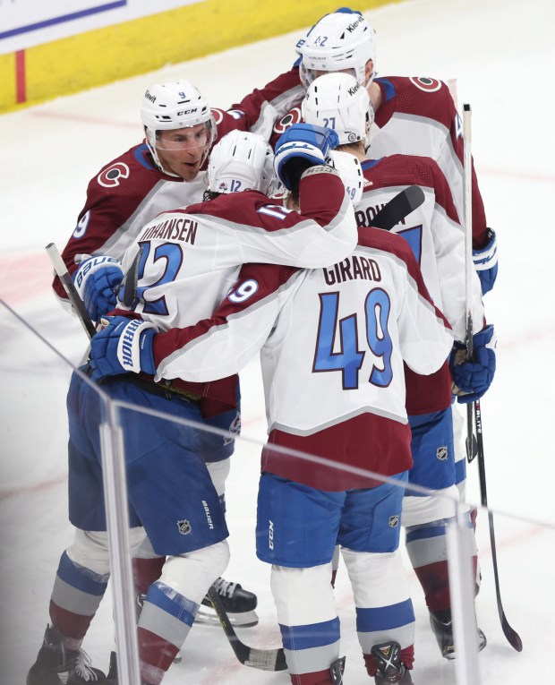 Avalanche players celebrate after a goal by center Ryan Johansen (12) in the second period against the Blackhawks at the United Center on February 29, 2024.  (John J. Kim/Chicago Tribune)