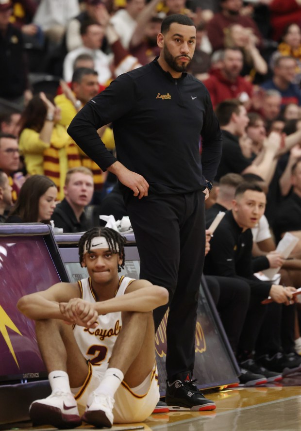 Loyola coach Drew Valentine watches from the sideline during the first half against Dayton at Gentile Arena on March 1, 2024.  (John J. Kim/Chicago Tribune)