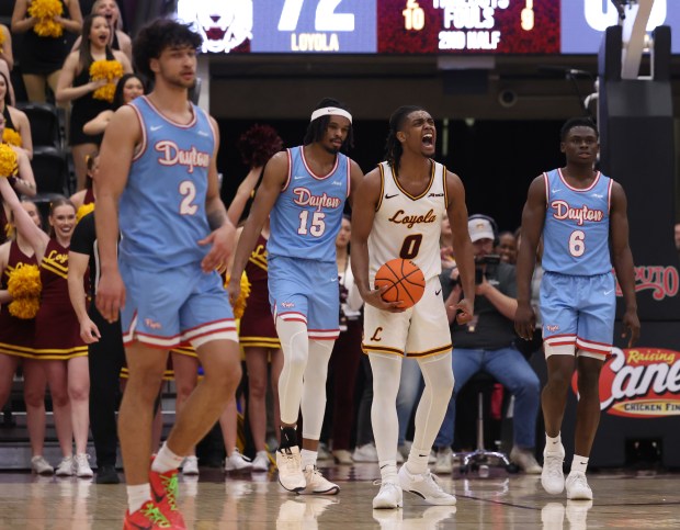 Loyola guard Javon Bennett (0) shouts in celebration after causing a Dayton turnover in the second half at Gentile Arena on March 1, 2024.  (John J. Kim/Chicago Tribune)