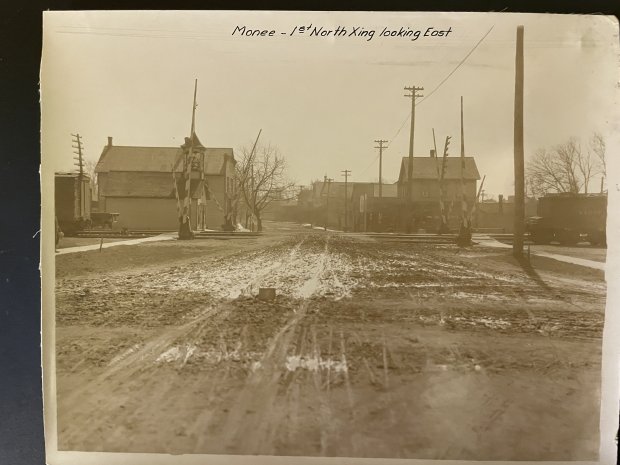 An undated photo provided by the Monee Historical Society shows a view looking east from Main Street at the Illinois Central Railroad tracks before the incident. "Cut," dropped the railroad track 25 feet below ground.  (Monee Historical Society)
