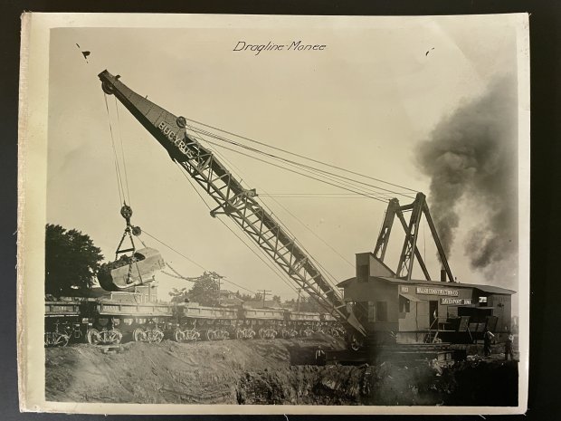 A steam shovel digs some of the soil "Cut" At Monee in this undated photo provided by the Monee Historical Society.  The valley running through the village was dug by the Illinois Central Railroad in 1922 and 1923 to reduce the grade that trains had to overcome to pass through the town. (Monee Historical Society)