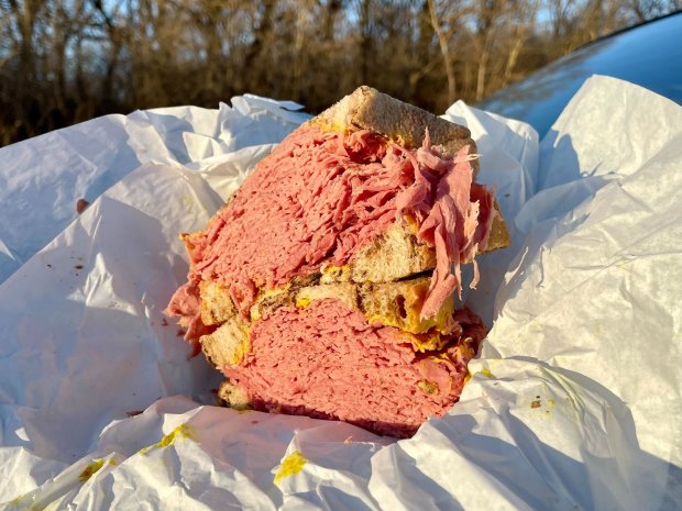 A Pounder Corned Beef sandwich with mustard on rye bread at the Prosecutor's Corned Beef Stand in Oak Forest, southwest of Chicago, on February 18, 2024.  (Louisa Chu / Chicago Tribune)