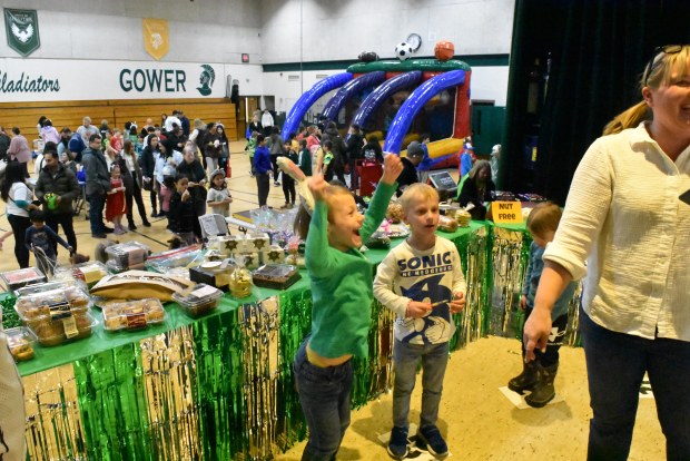 Finn Tagmeier cheers after winning a cookie in the cake walk at the Gower Fun Fair on Friday night.  (Jesse Wright)