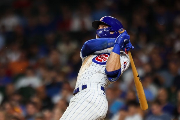 Cubs second baseman Nico Hoerner hits a home run against the Reds at Wrigley Field on August 1, 2023.  (Eileen T. Meslar/Chicago Tribune)
