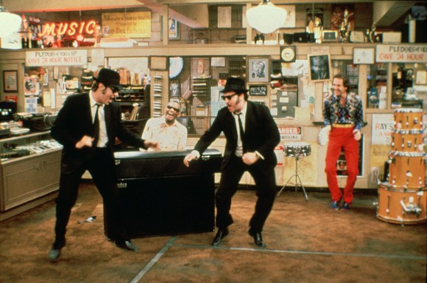 Dan Akroyd and John Belushi during production "Blues Brothers" The film stars Ray Charles and Murphy Dunne on piano.  (Universal Studios)
